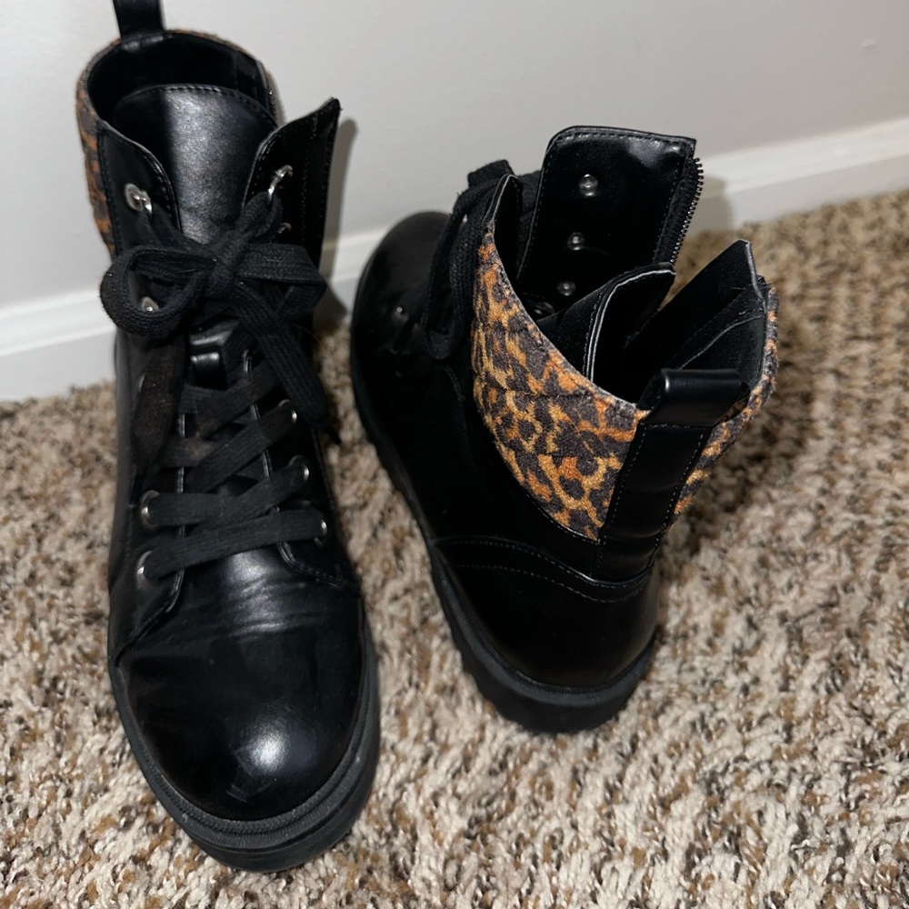 Nine West, black and cheetah combat boots, size 6.